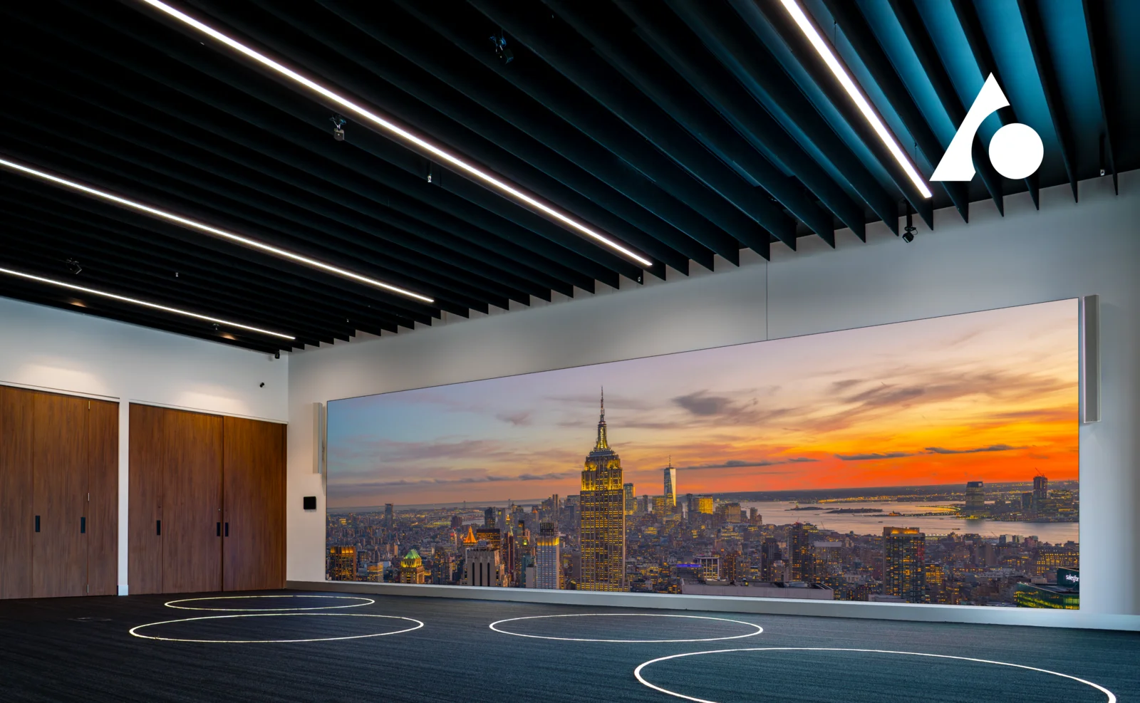 Aurora large-format LED videowall in a Sydney broadcast/production room showing a New York skyline at sunset