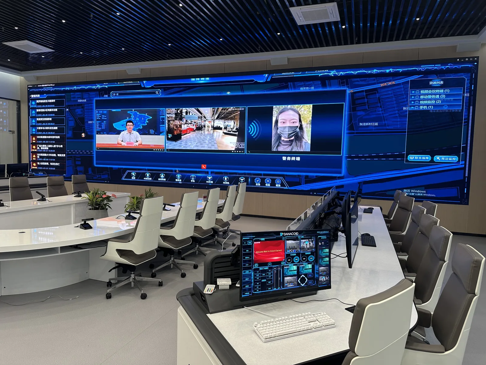 Aurora multi-panel LED video wall in a command and control room with operator desks, dashboards and live camera feeds