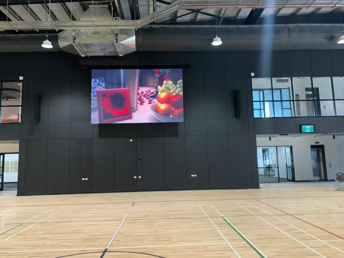 Aurora gymnasium LED display showing live sport scoring