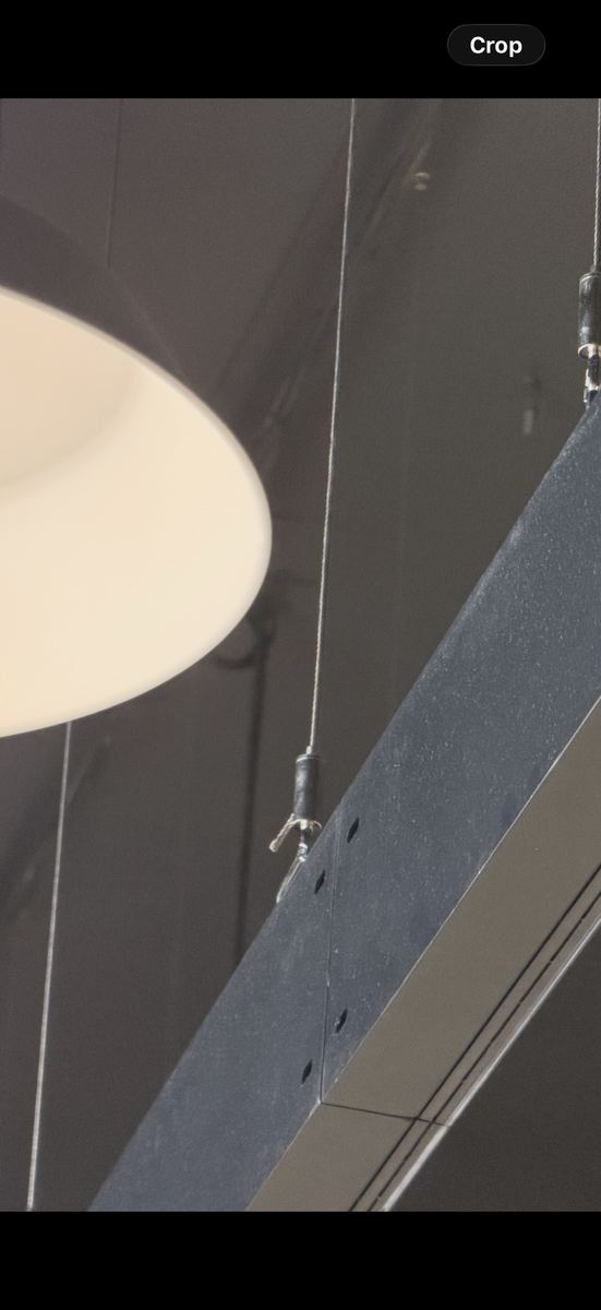 Cabinet chassis side — screw-holes and welded seam visible