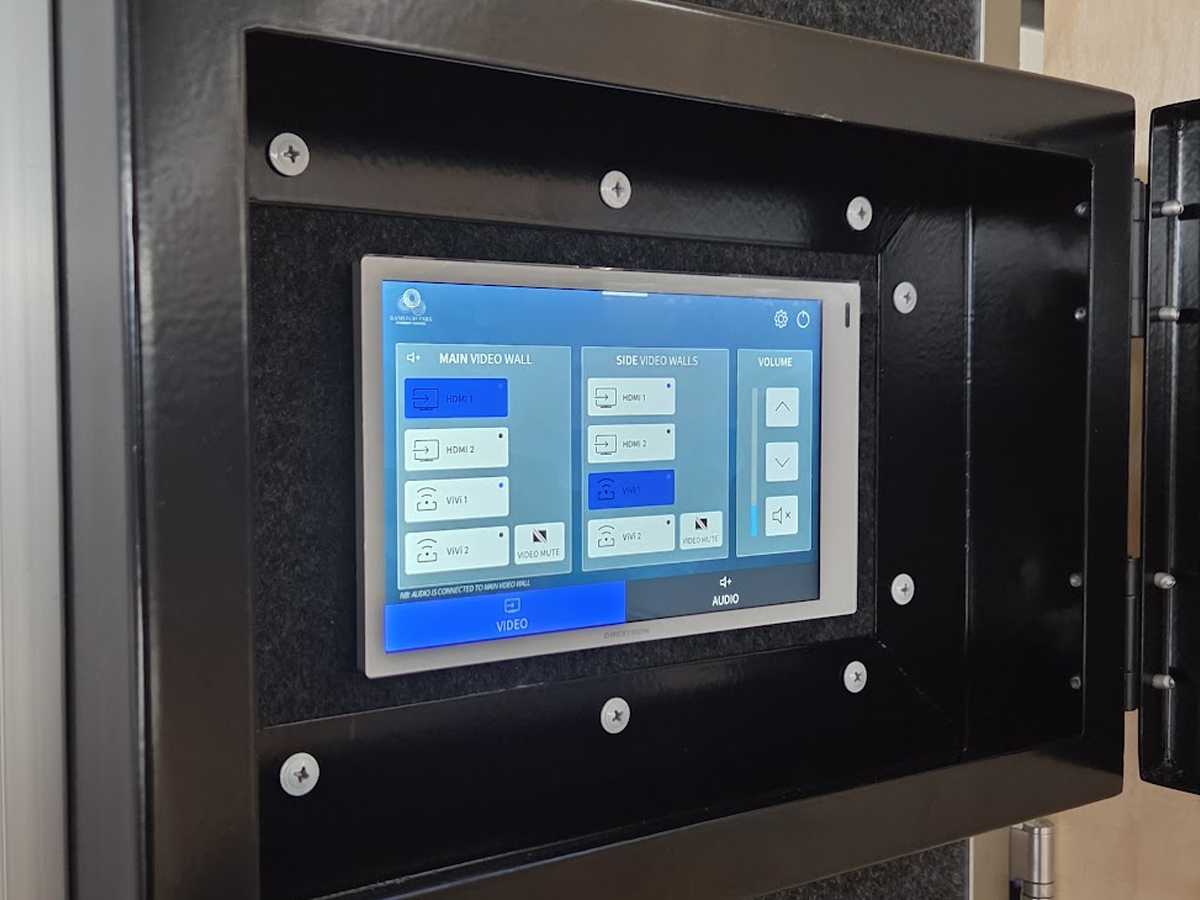 Crestron TSW-770 7" touch panel — one-press orientation and source control