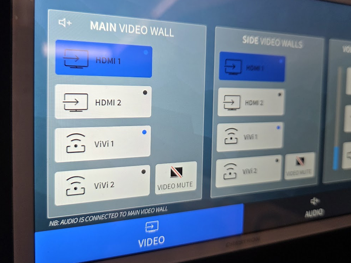 Crestron TSW-770 video routing screen — teacher-operated AV control interface